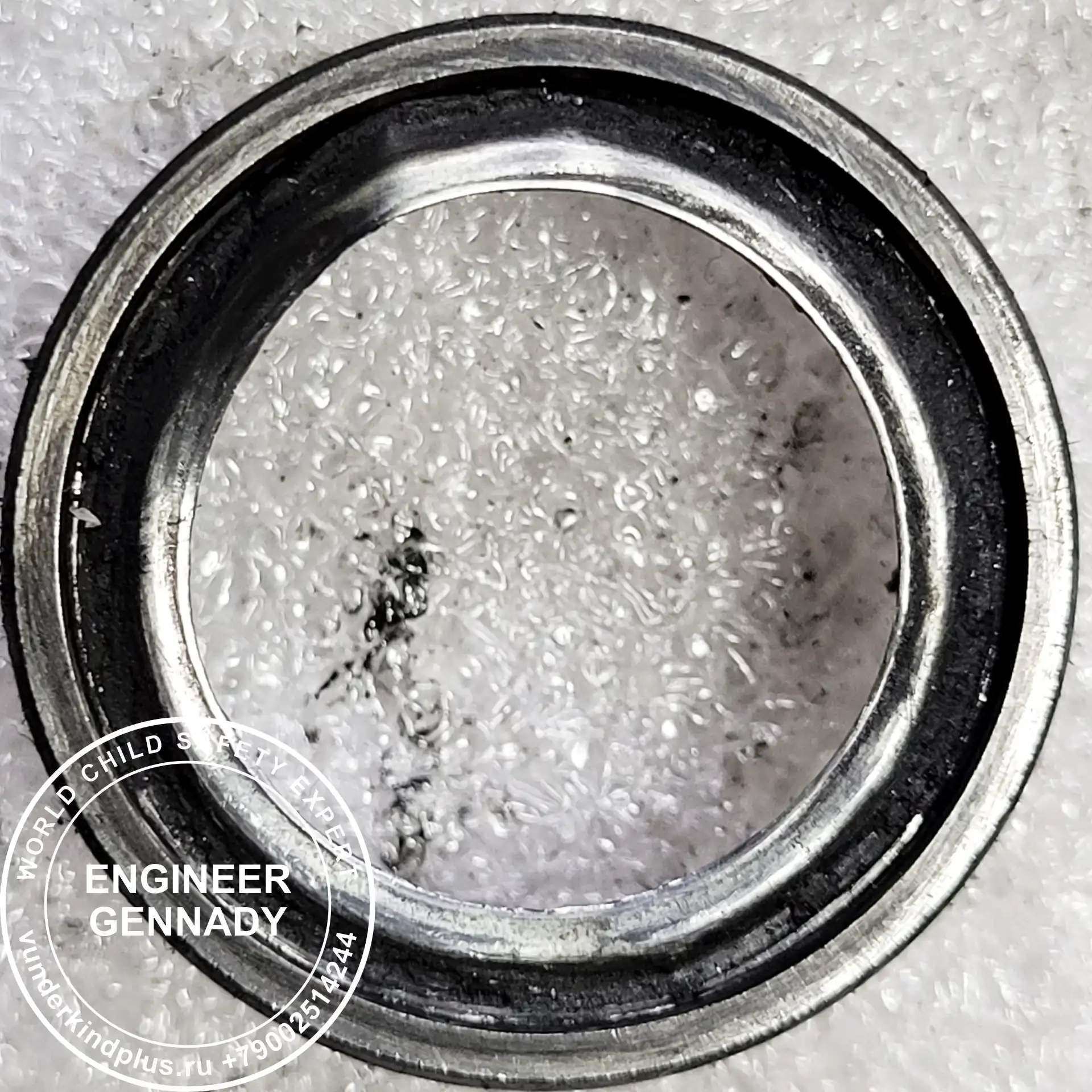 Macro photo of an empty outer bearing race without balls.