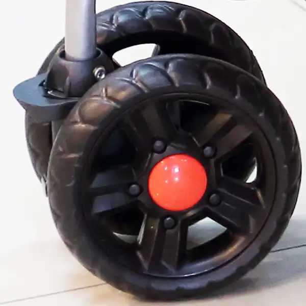 Hard PVC stroller wheels showing low shock absorption on bumpy roads