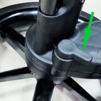 Adjustable stroller suspension switch showing hard and soft settings for different terrain types-1